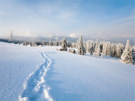 simsearch:400-04319458,k - winter calm mountain landscape with sheds group and mount ridge behind (Kukol Mount, Carpathian Mountains, Ukraine) Stock Photo - Budget Royalty-Free & Subscription, Code: 400-04697420