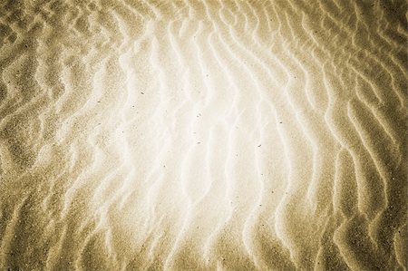 Beach with soft sand, rippled texture of windblown effect Fotografie stock - Microstock e Abbonamento, Codice: 400-04697449