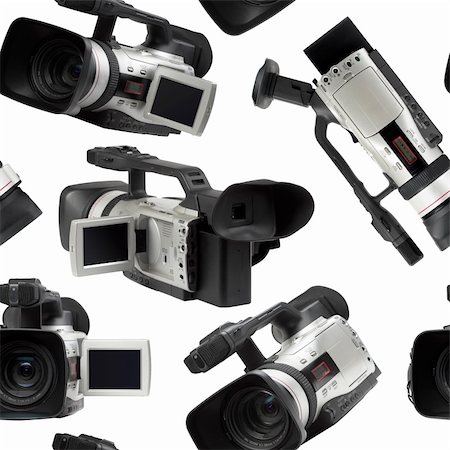 simsearch:400-07518893,k - Semi professional video camcorders isolated over white seamless wallpaper background Foto de stock - Royalty-Free Super Valor e Assinatura, Número: 400-04697799