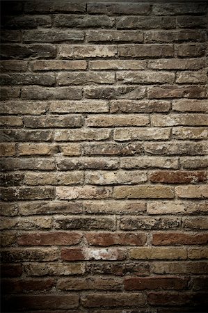 simsearch:400-05105343,k - A wall of aged grey and red bricks Photographie de stock - Aubaine LD & Abonnement, Code: 400-04698144
