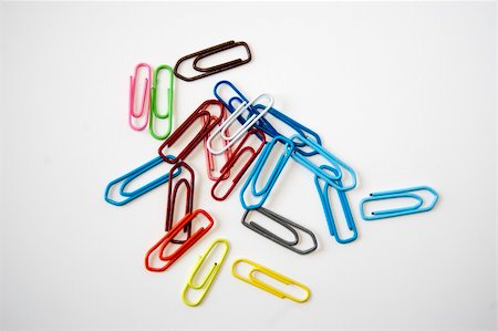 simsearch:400-05056079,k - Many colored paper clips isolated on white Stock Photo - Budget Royalty-Free & Subscription, Code: 400-04698149