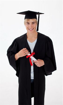 Teen Guy Celebrating Graduation agaisnt white background Foto de stock - Super Valor sin royalties y Suscripción, Código: 400-04698430
