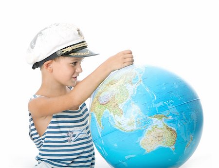 physical education - Boy holding a globe  isolated on white background Photographie de stock - Aubaine LD & Abonnement, Code: 400-04698997