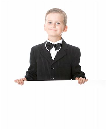 simsearch:400-04340435,k - Boy holding a banner isolated on white background Stock Photo - Budget Royalty-Free & Subscription, Code: 400-04698998