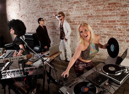 rock band four men - Female DJs dancing and playing music at a party Stock Photo - Budget Royalty-Free & Subscription, Code: 400-04699033