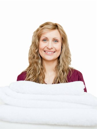 Portrait of a woman against white background with white towels Stock Photo - Budget Royalty-Free & Subscription, Code: 400-04699070