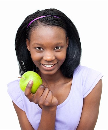 simsearch:400-04564052,k - Smiling young woman eating an apple against a white background Foto de stock - Super Valor sin royalties y Suscripción, Código: 400-04699087