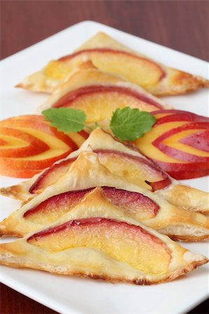 simsearch:400-04380218,k - Delicious puff pastry triangles with fresh nectarines Stock Photo - Budget Royalty-Free & Subscription, Code: 400-04699527