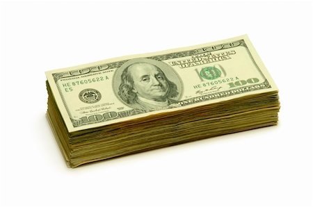 simsearch:400-04577394,k - Stack of $100 banknotes on a white surface Stockbilder - Microstock & Abonnement, Bildnummer: 400-04699562