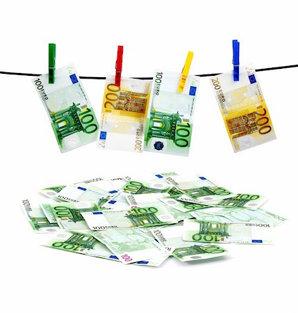 simsearch:693-06021291,k - Banknotes drying on a rope after laundry Stockbilder - Microstock & Abonnement, Bildnummer: 400-04699793