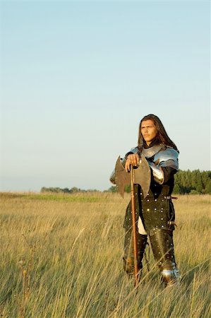 Medieval knight in the field with an axe Stock Photo - Budget Royalty-Free & Subscription, Code: 400-04699957