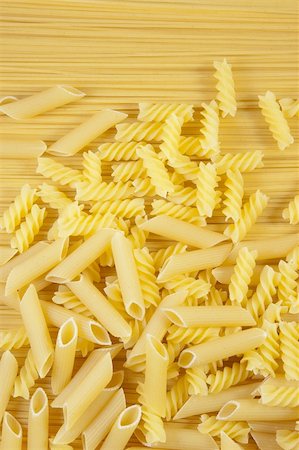 simsearch:400-05270612,k - Background. Macaroni on long spaghetti. Close up . Photographie de stock - Aubaine LD & Abonnement, Code: 400-04690409