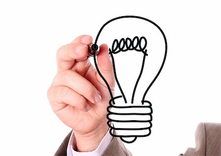 Businessman hand drawing black light bulb isolated on white Stock Photo - Budget Royalty-Free & Subscription, Code: 400-04690496