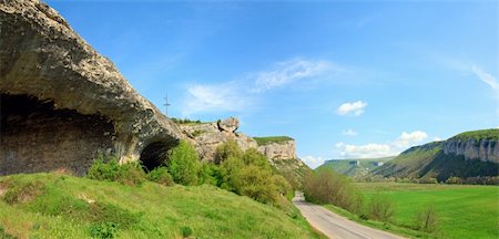 Spring Crimea (Ukraine) landscape with plateau and valley.  On the left - ancient cave settlement (Crimea, Ukraine). Two shots stitch image. Stock Photo - Budget Royalty-Free & Subscription, Code: 400-04690545