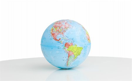 simsearch:400-05349061,k - A terrestrial globe against a white background Foto de stock - Super Valor sin royalties y Suscripción, Código: 400-04690647