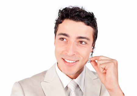 simsearch:400-04119293,k - Positive ethnic businessman with headset on isolated on a white background Fotografie stock - Microstock e Abbonamento, Codice: 400-04690860