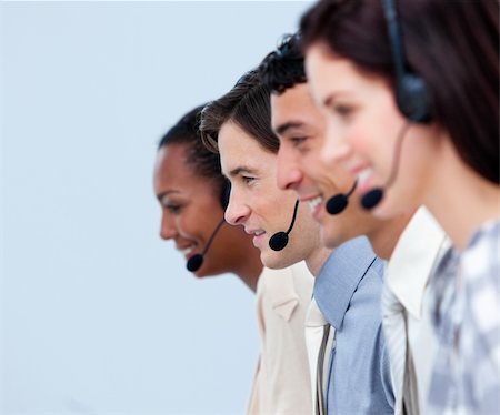 simsearch:400-04188205,k - Cheerful customer service representatives in a call center Stock Photo - Budget Royalty-Free & Subscription, Code: 400-04690911
