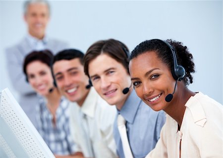 simsearch:400-04188205,k - Charming customer service representatives in a call center Stock Photo - Budget Royalty-Free & Subscription, Code: 400-04690913
