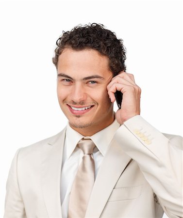 simsearch:400-04782151,k - Young hispanic businessman using a mobile phone against a white background Photographie de stock - Aubaine LD & Abonnement, Code: 400-04691277