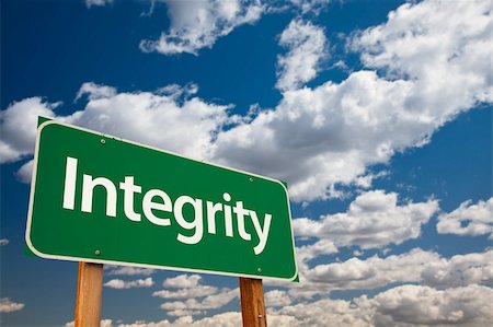 Integrity Green Road Sign with Copy Room Over The Dramatic Clouds and Sky. Stock Photo - Budget Royalty-Free & Subscription, Code: 400-04691567