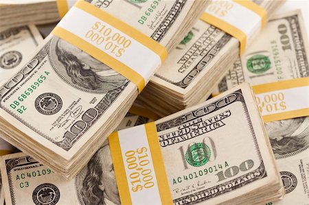 franklin - Stacks of Ten Thousand Dollar Piles of One Hundred Dollar Bills Stock Photo - Budget Royalty-Free & Subscription, Code: 400-04691594