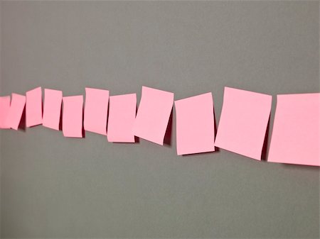 simsearch:696-03400039,k - Row of Pink Adhesive Notes on grey background Stock Photo - Budget Royalty-Free & Subscription, Code: 400-04692329