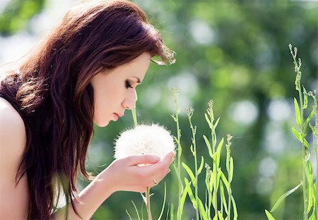 simsearch:400-04107729,k - Girl is blowing on dandelion. Stock Photo - Budget Royalty-Free & Subscription, Code: 400-04693132