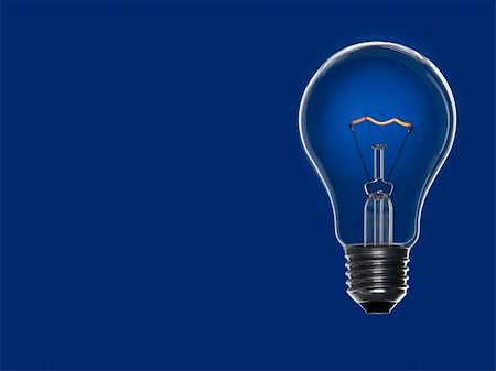 simsearch:630-01709841,k - A light bulb over a blue background. Tungsten glowing filament. Copy space. Photographie de stock - Aubaine LD & Abonnement, Code: 400-04693262