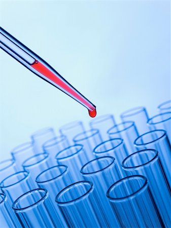 simsearch:400-07091851,k - Close up of a pipette dropping a red sample into a test tube. Stock Photo - Budget Royalty-Free & Subscription, Code: 400-04693270