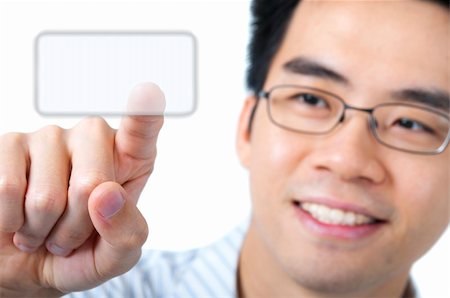 Asian business man pressing a touchscreen button Stock Photo - Budget Royalty-Free & Subscription, Code: 400-04693604