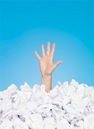 drowning in a pile - Human Buried in white papers on blue background Photographie de stock - Aubaine LD & Abonnement, Code: 400-04693781