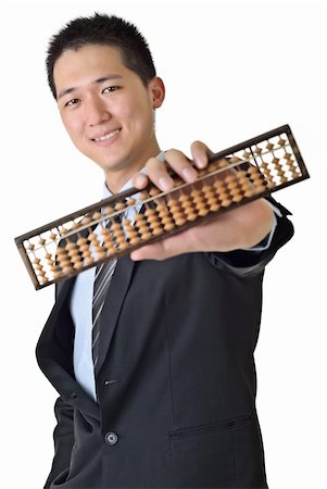 Chinese business man holding traditional abacus, focus on face, closeup portrait on white background. Stock Photo - Budget Royalty-Free & Subscription, Code: 400-04704643