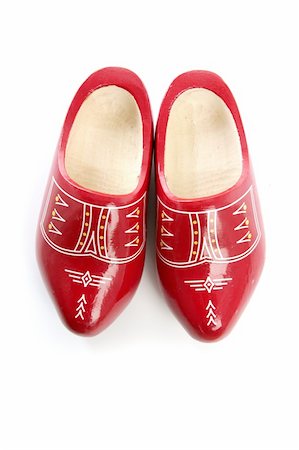 Dutch Holland red wooden shoes isolated on white studio background Stock Photo - Budget Royalty-Free & Subscription, Code: 400-04704680