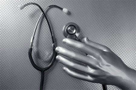 simsearch:625-00898592,k - Health stethoscope futuristic silver gray hand concept metaphor Fotografie stock - Microstock e Abbonamento, Codice: 400-04704695