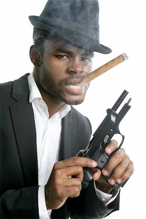 simsearch:400-05005666,k - African american mafia man smoking cigar with handgun portrait Foto de stock - Super Valor sin royalties y Suscripción, Código: 400-04704747