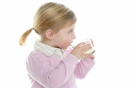 simsearch:400-04218582,k - blond little girl drinking glass of milk isolated on white Photographie de stock - Aubaine LD & Abonnement, Code: 400-04704896