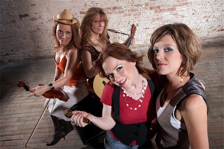 simsearch:400-04655366,k - All-Female band members gathering before a performance Stock Photo - Budget Royalty-Free & Subscription, Code: 400-04705153