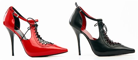 simsearch:400-05355917,k - Two high-heeled female shoes with lacing isolated on white background Foto de stock - Super Valor sin royalties y Suscripción, Código: 400-04705217