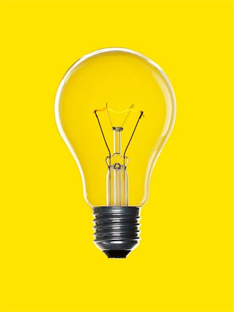 simsearch:630-01709841,k - A light bulb over a yellow background. Tungsten glowing filament. Photographie de stock - Aubaine LD & Abonnement, Code: 400-04705378
