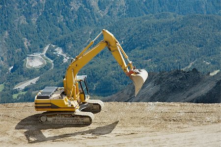 simsearch:600-03152800,k - Excavator machine at a high mountain construction site Foto de stock - Super Valor sin royalties y Suscripción, Código: 400-04705805