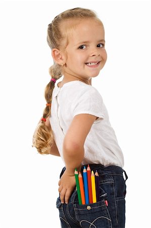 simsearch:400-04131892,k - Little girl with lots of pencils in her pocket looking back - isolated Stockbilder - Microstock & Abonnement, Bildnummer: 400-04706447