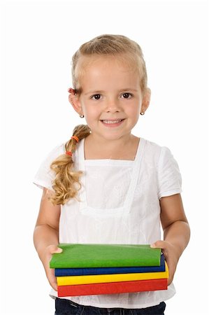 simsearch:400-04131892,k - Little girl with lots of school books smiling happily - isolated Stockbilder - Microstock & Abonnement, Bildnummer: 400-04706449