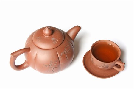 simsearch:400-06176508,k - Teapot and a cup of green tea. Isolated on white Photographie de stock - Aubaine LD & Abonnement, Code: 400-04706503