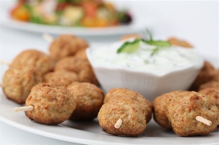 Roast meatballs on skewers and tzatziki dip. Shallow DOF Stock Photo - Budget Royalty-Free & Subscription, Code: 400-04707331