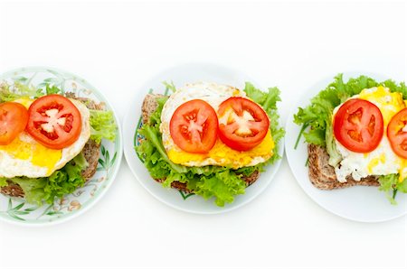 Fresh egg sandwich on plate in row Stock Photo - Budget Royalty-Free & Subscription, Code: 400-04707617