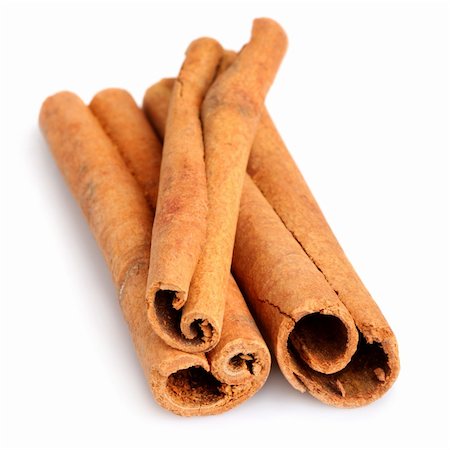 simsearch:400-04754857,k - Cinnamon sticks isolated on white background. Shallow DOF Stock Photo - Budget Royalty-Free & Subscription, Code: 400-04707897