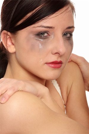 Abused young woman over white background Stock Photo - Budget Royalty-Free & Subscription, Code: 400-04708086