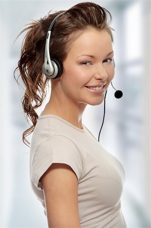 simsearch:400-03985399,k - Beautiful Call Center Woman Wearing A Telephone Headset Photographie de stock - Aubaine LD & Abonnement, Code: 400-04708106