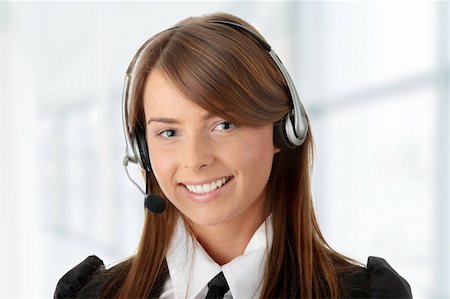 simsearch:400-03985399,k - Beautiful Call Center Woman Wearing A Telephone Headset, isolated on white background Photographie de stock - Aubaine LD & Abonnement, Code: 400-04708203