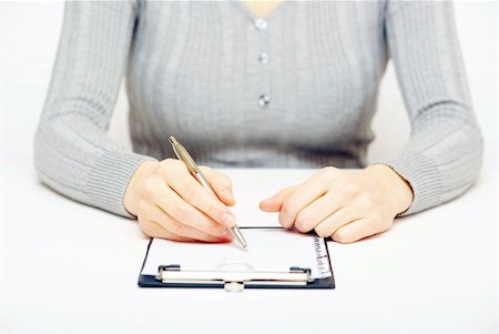 simsearch:400-06454922,k - Pen in woman hand isolated on wood background Stock Photo - Budget Royalty-Free & Subscription, Code: 400-04708888